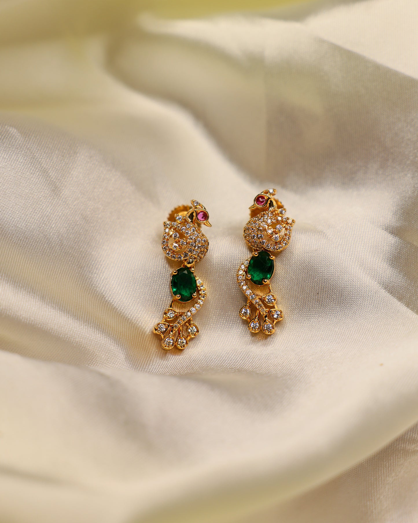 Mayuri Ratna Emerald Studs premium Gold Polished Earings by Suwarnikaa jewels