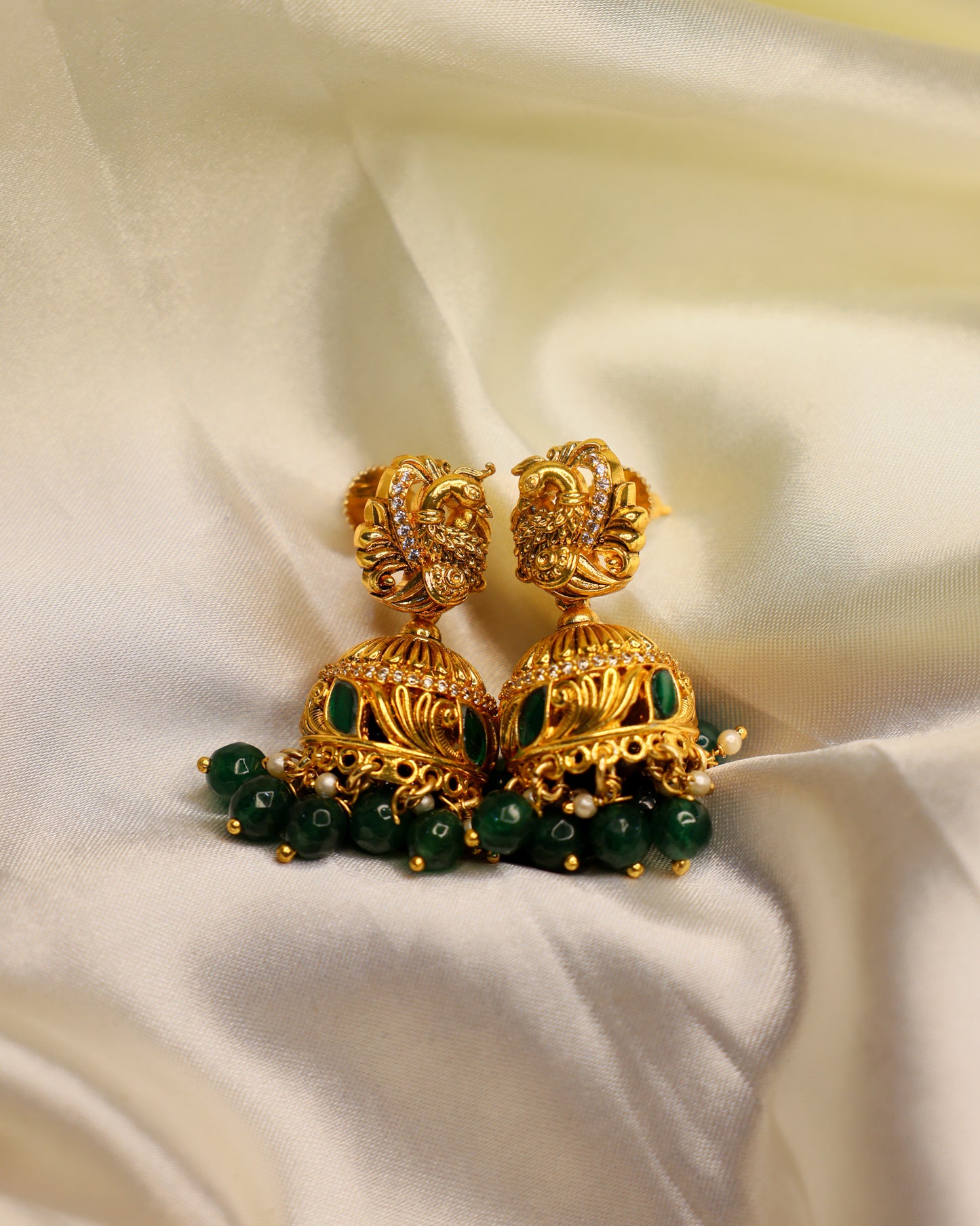 Mayura Alankara Emareld Jhumkalu premium Gold Polished Earings by Suwarnikaa jewels