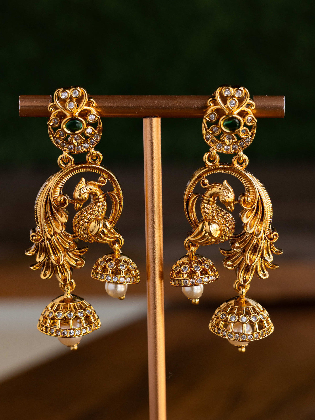 Suvarna Mayuri Jhumkas premium Gold Polished Earings by Suwarnikaa jewels
