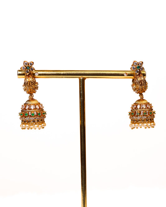 Padmavalli emerald Pearl Makara Kundhana Jhumkas premium Gold Polished Earings by Suwarnikaa jewels