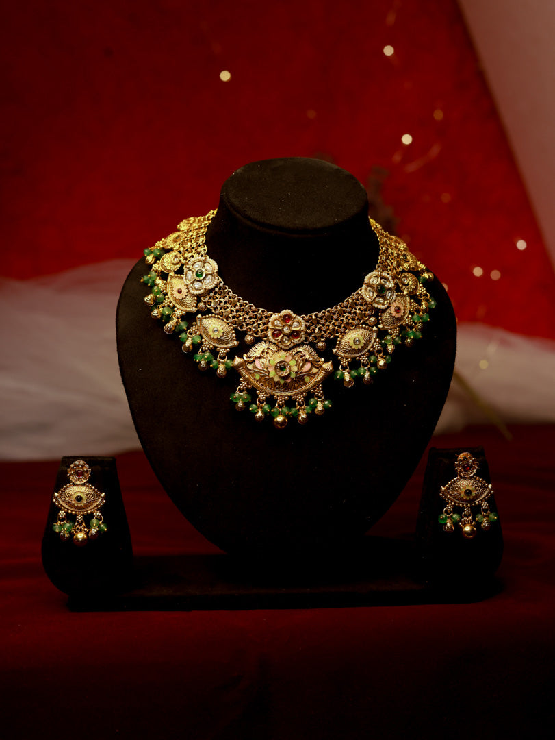 Gold Plated Neck Set with Highlighted Big Boss Eye Design