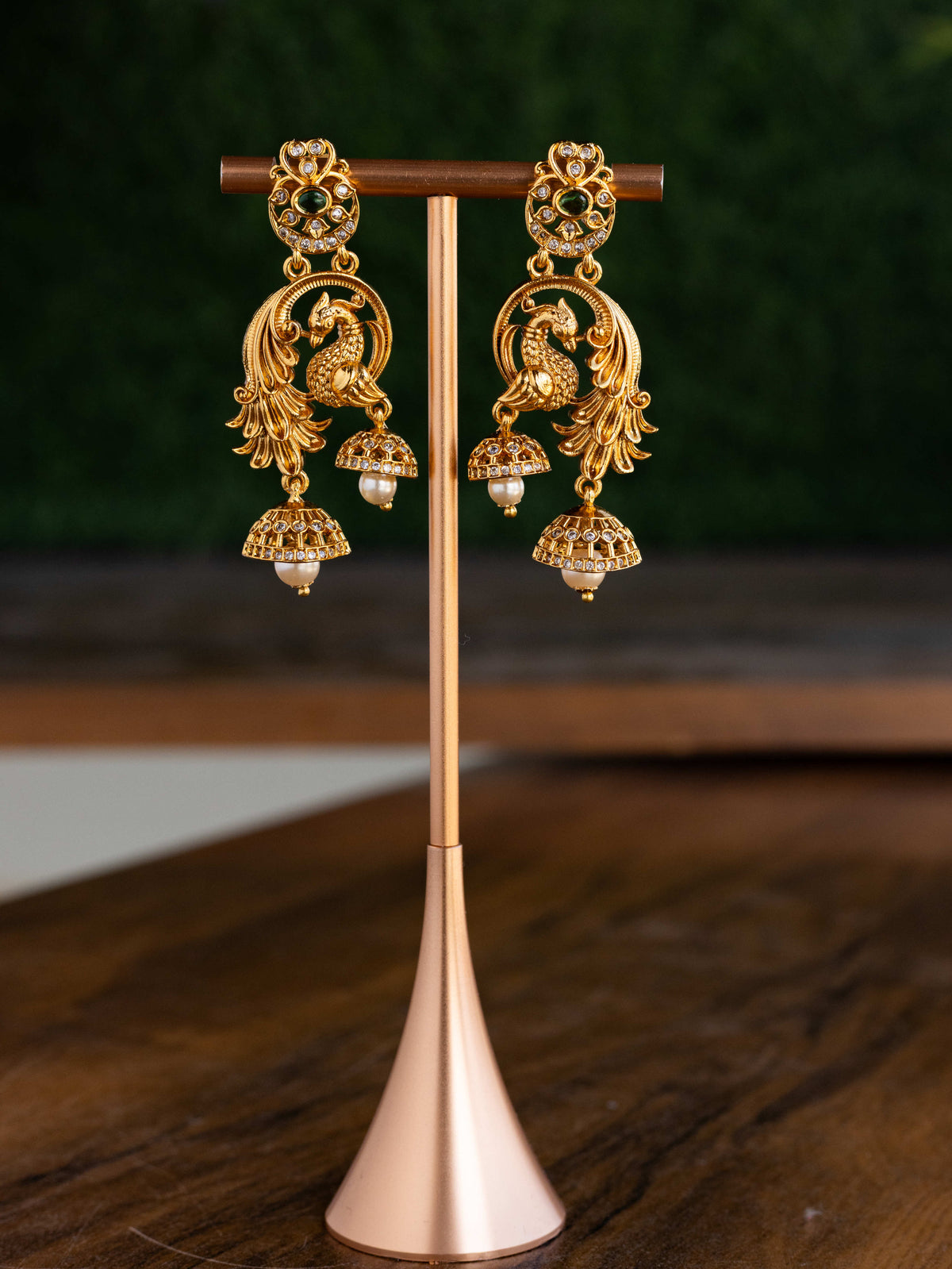 Suvarna Mayuri Jhumkas premium Gold Polished Earings by Suwarnikaa jewels
