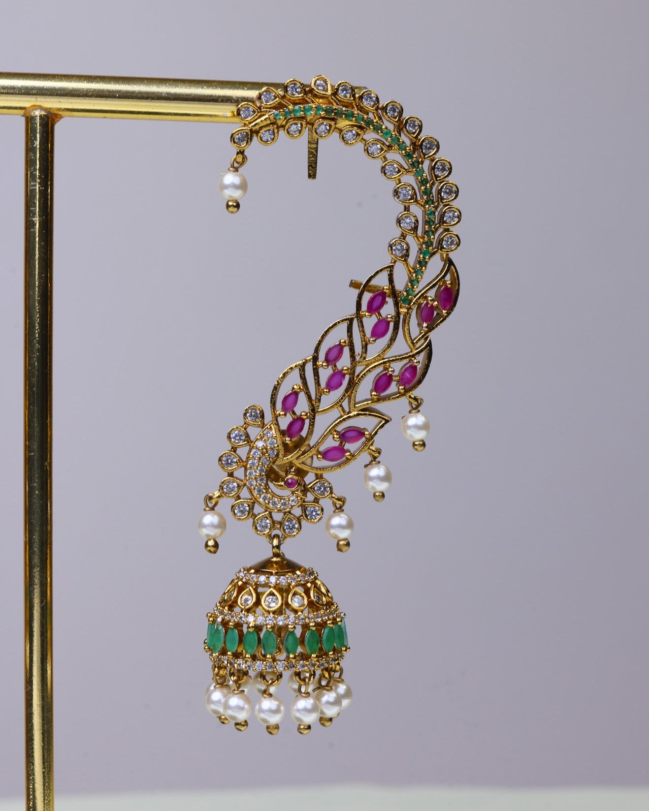 Swarna Valli Arc Jhumkas by Suwarnikaa jewels