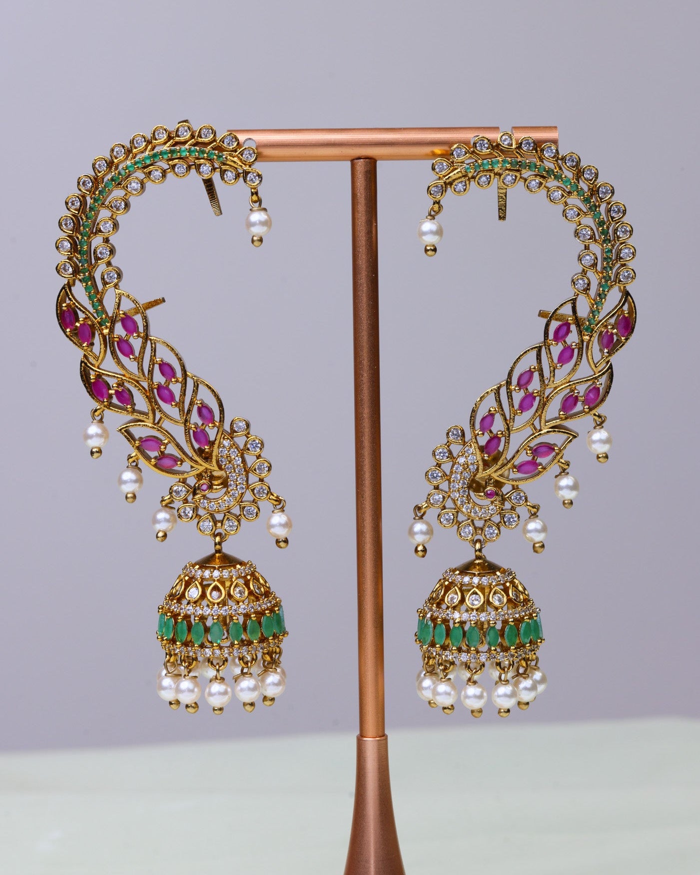 Swarna Valli Arc Jhumkas by Suwarnikaa jewels