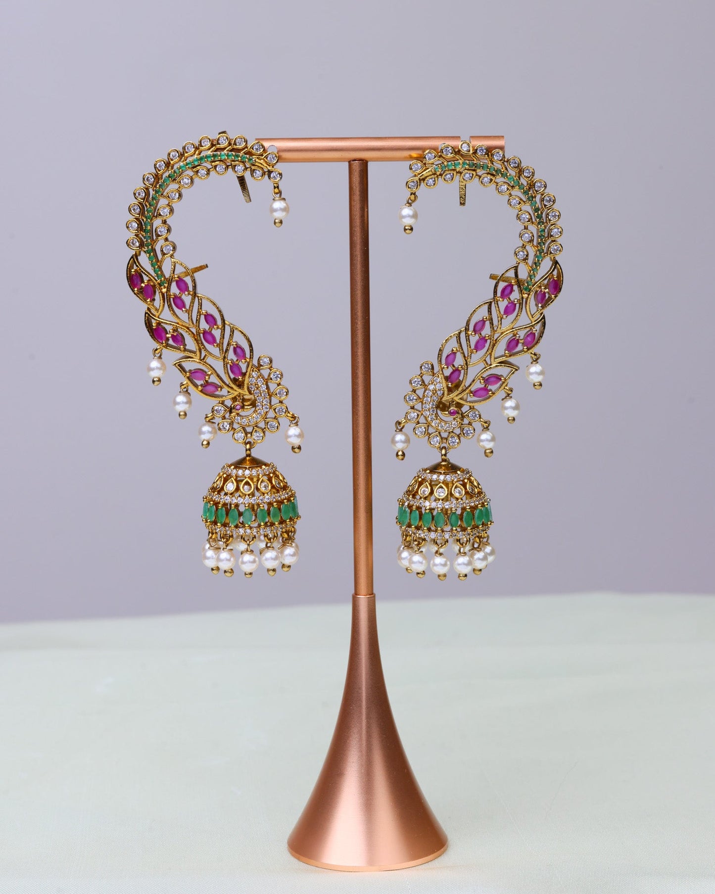 Swarna Valli Arc Jhumkas by Suwarnikaa jewels