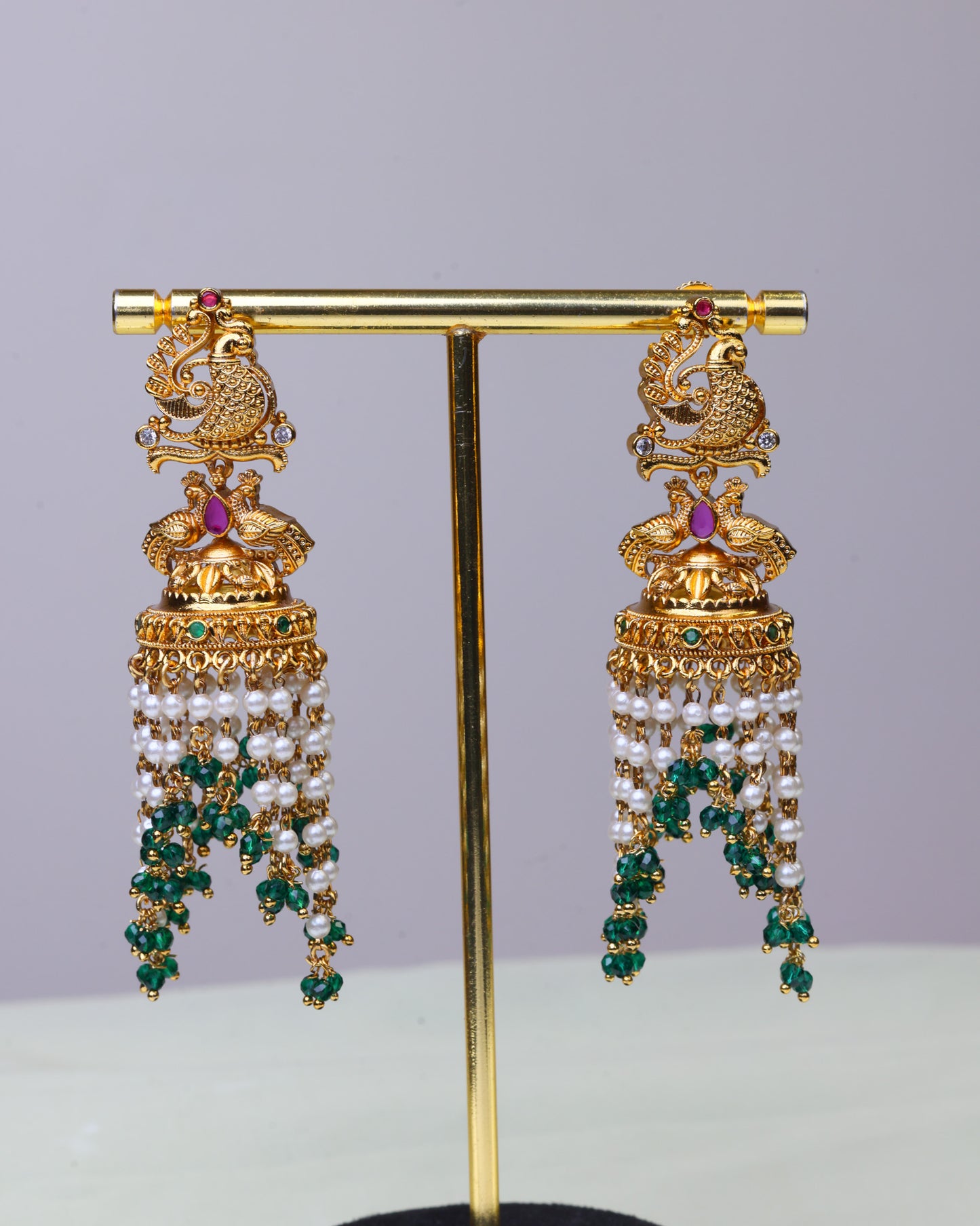 Swarna Mayura emerald Pearl Drop Jhumkas  by Suwarnikaa jewels