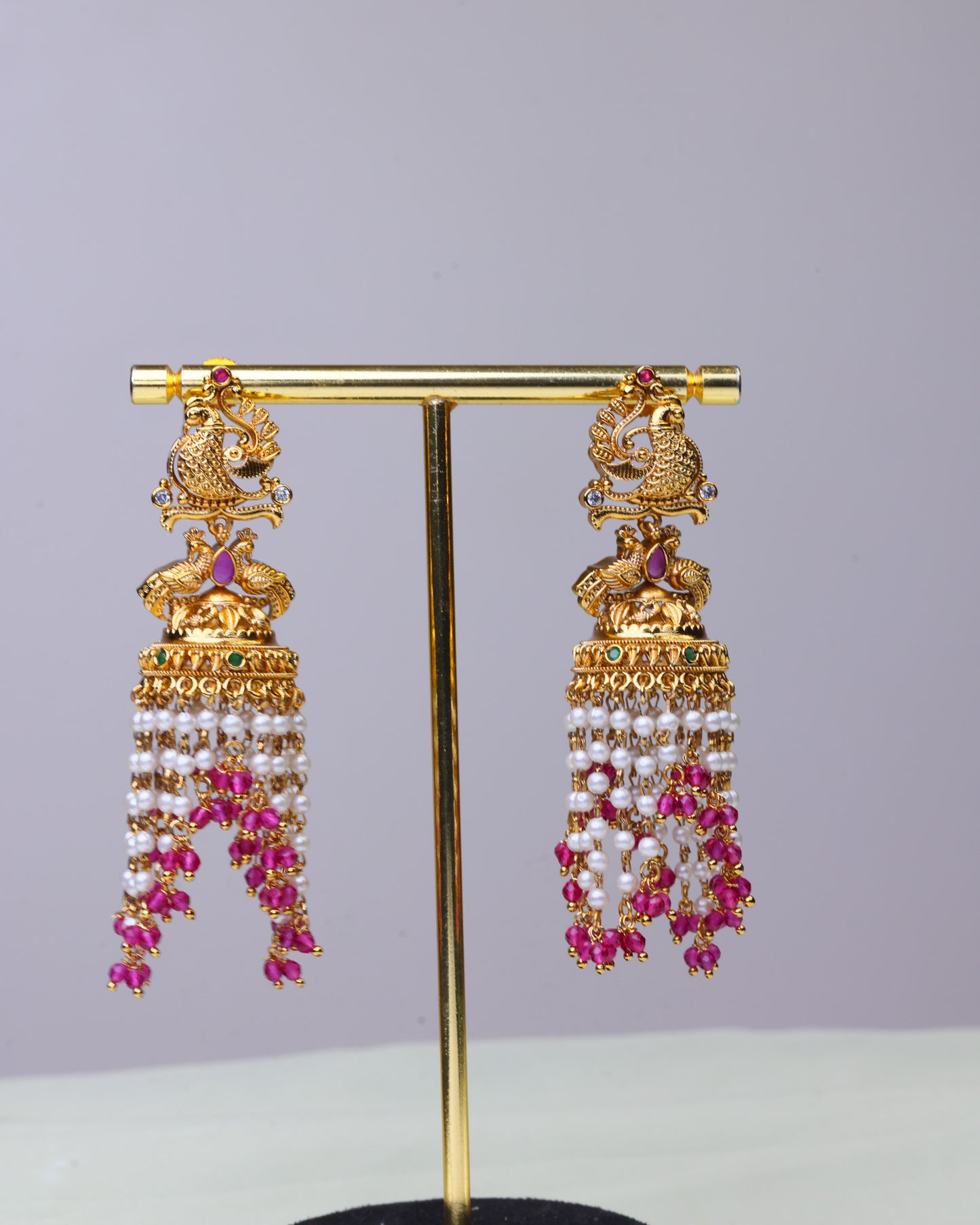 Swarna Mayura Ruby Pearl Drop Jhumkas  by Suwarnikaa jewels