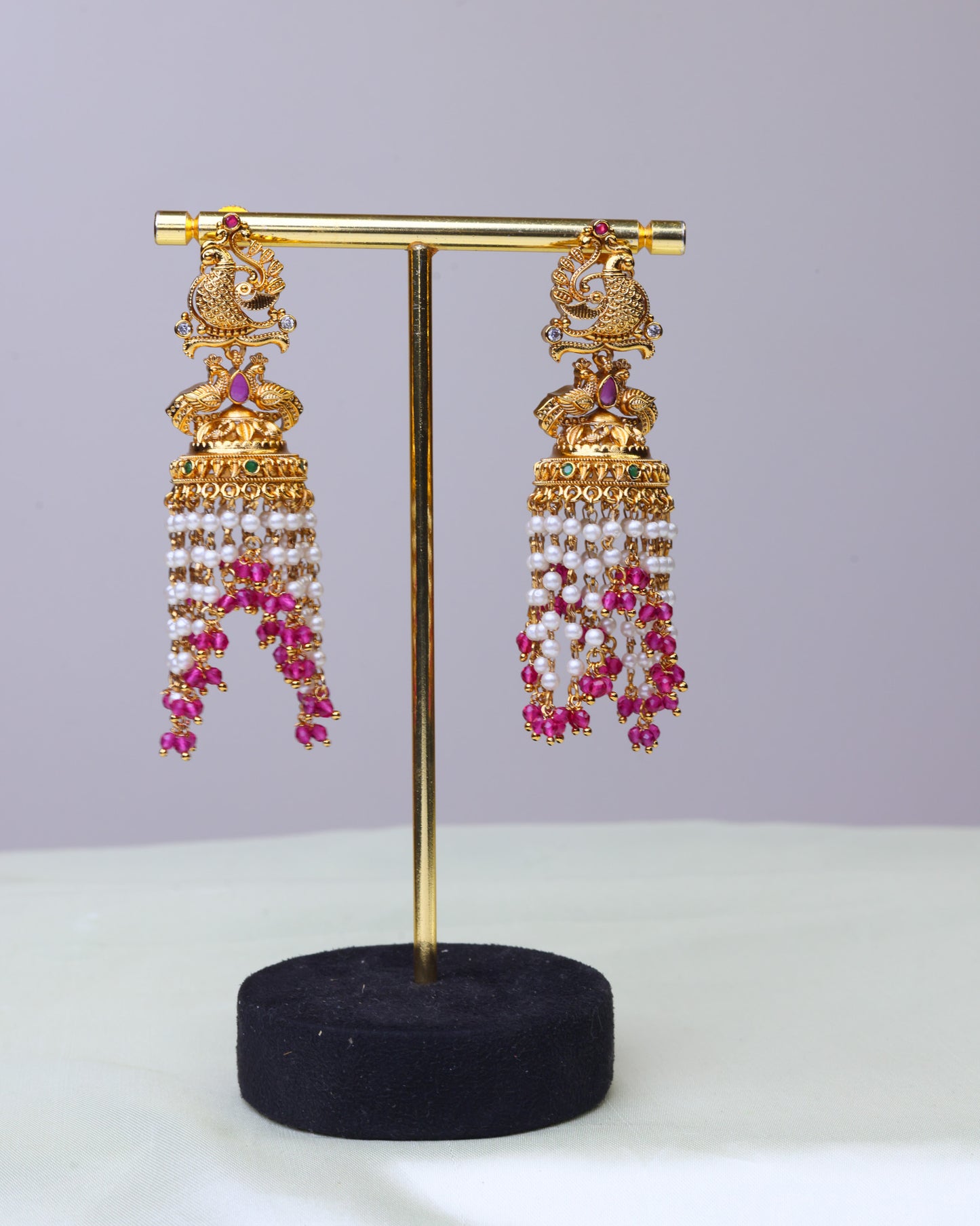 Swarna Mayura Ruby Pearl Drop Jhumkas  by Suwarnikaa jewels